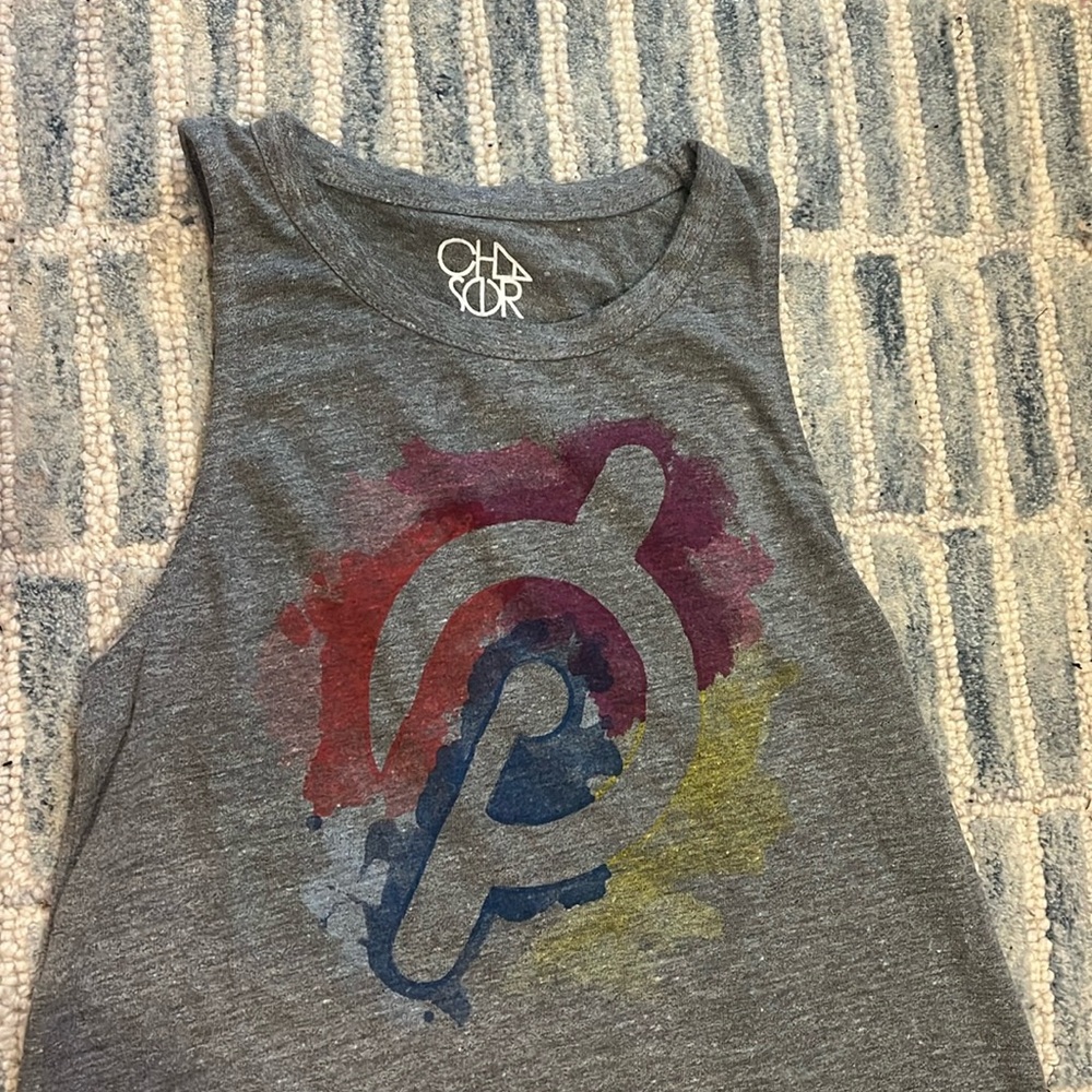 Peloton tank top with colorful peloton logo